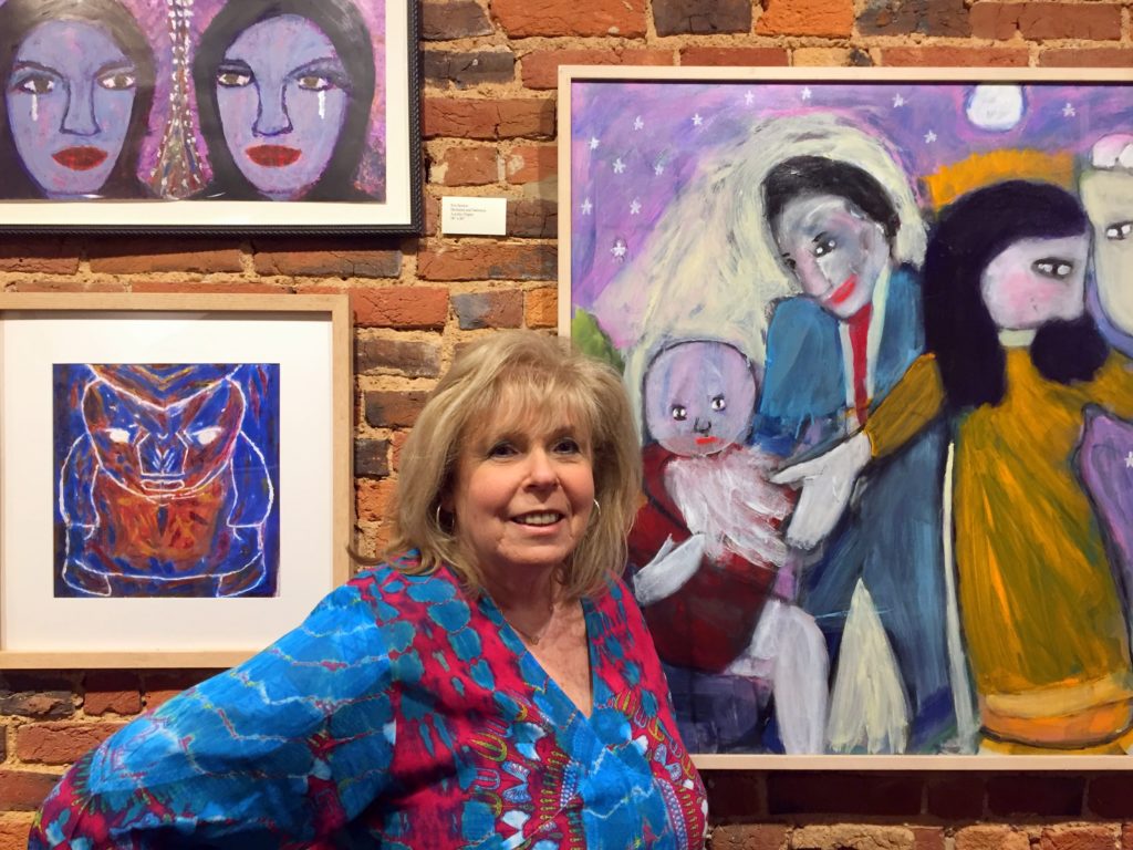 Marion Cohen Pictured with Artwork by Rex Sexton
